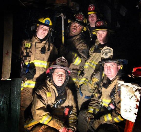 Firefighters in a Group. We offer therapy to 1st responders.